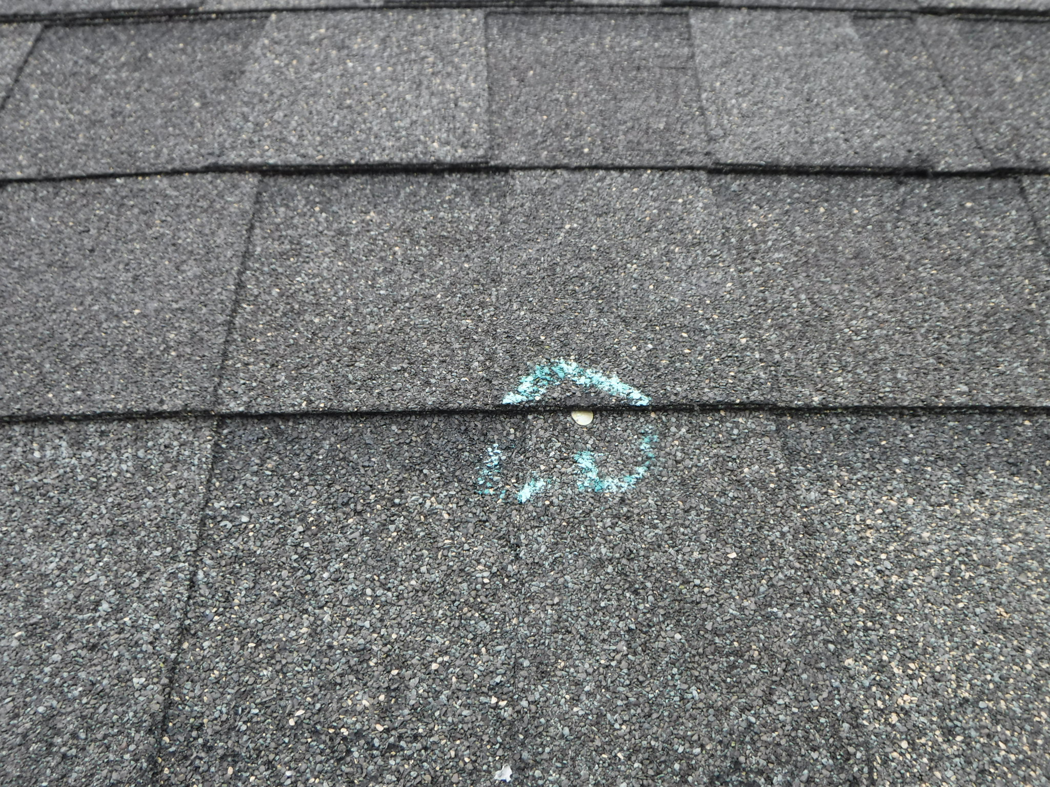 A roof shingle that is nailed too low